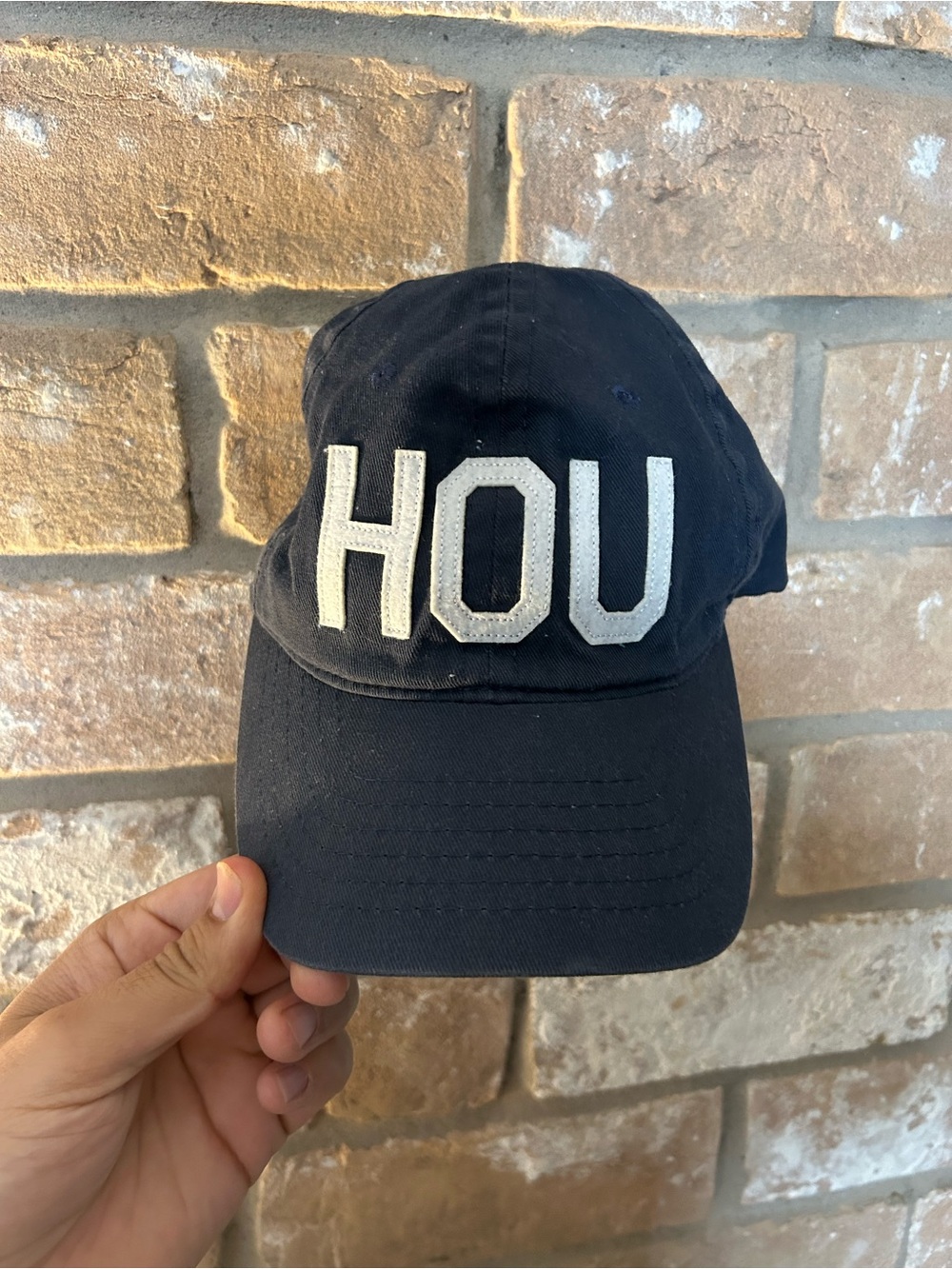 HOU (Houston) Embroidered Navy Baseball Cap - one size fits most.